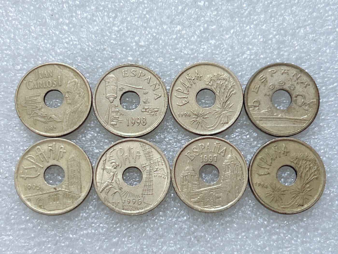 第一海外回流一元起拍收藏 散集专场  第307期 西班牙不同版本25比塞塔黄铜币 8枚