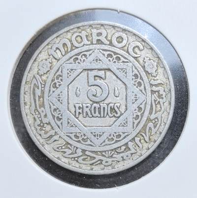 外国优质老铜币银币苏联纪念章，每周六晚九点倒数截拍，满百包邮可寄存，持续收拍 - 法属摩洛哥 1370 年5法郎，正面为六角星与面值，背面是谢里夫帝国铭文与回历年份，伊斯兰纹饰浓郁，见证摩洛哥保护国时期，是北非殖民与伊斯兰文化交融的珍贵实物见证，收藏辨识度高。