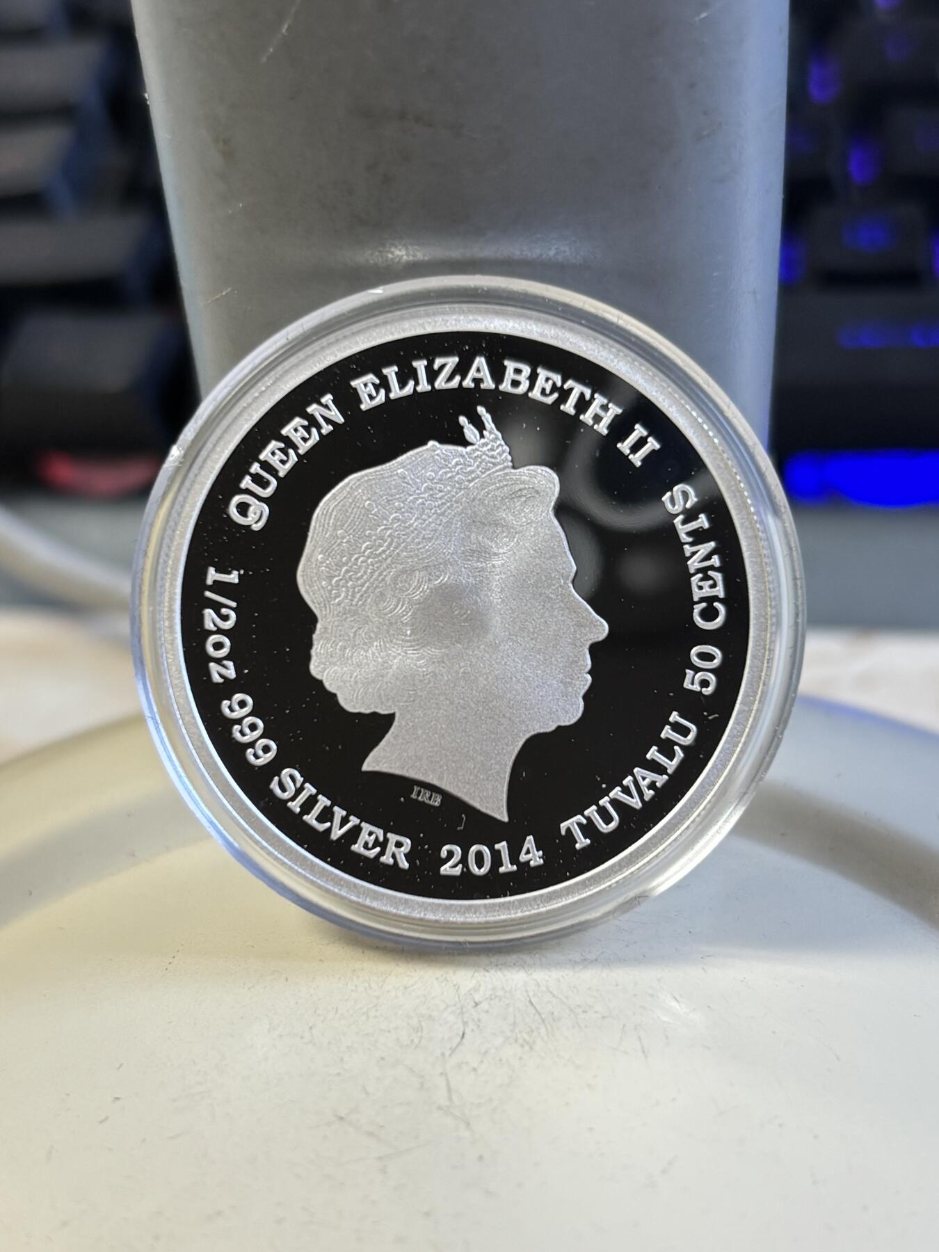 第195期拍卖 图瓦卢2014年母亲的爱系列大象彩色纪念银币，999银，发行6000枚