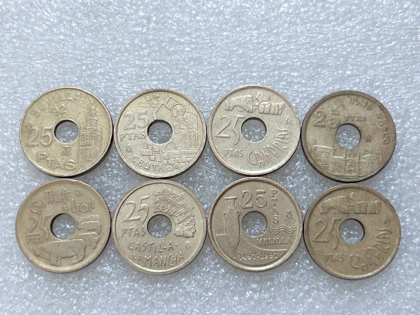 第一海外回流一元起拍收藏 散集专场  第307期 西班牙不同版本25比塞塔黄铜币 8枚