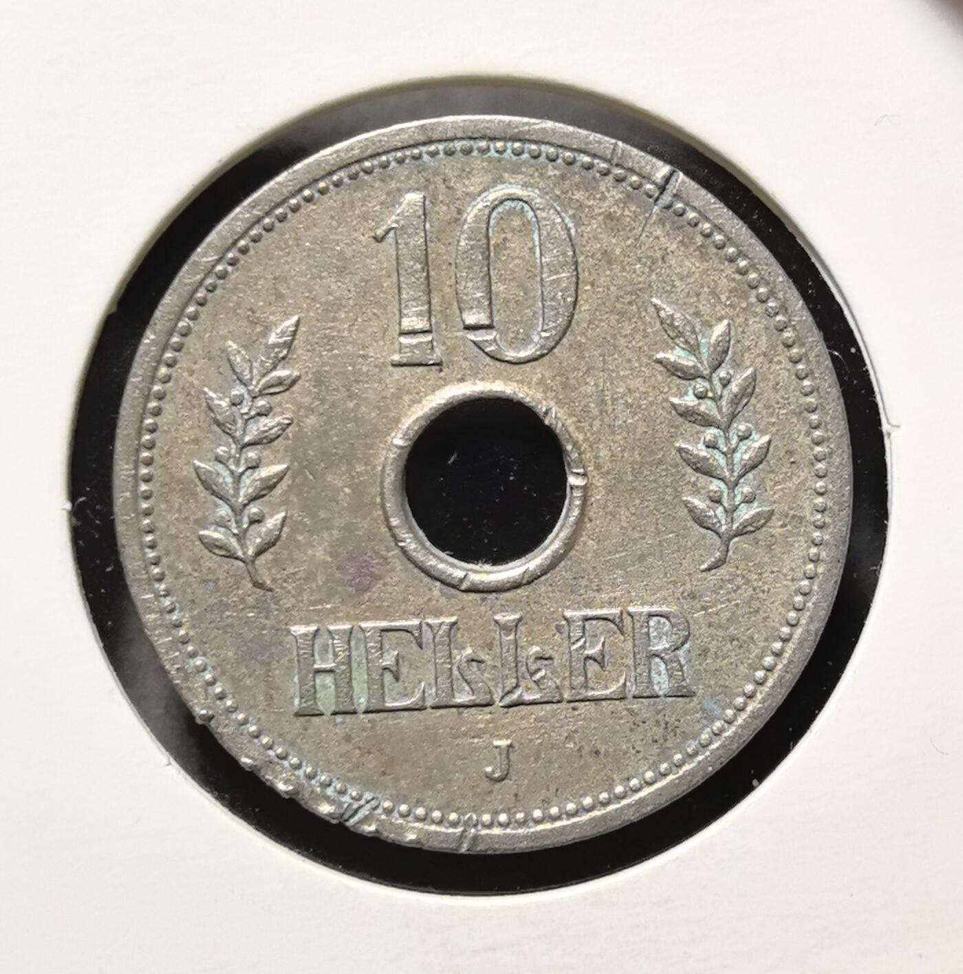 外国优质老铜币银币苏联纪念章，每周六晚九点倒数截拍，满百包邮可寄存，持续收拍 德属东非1910年10 赫勒镍币，正面饰有月桂枝与面值，背面刻有帝国皇冠、年份及 “DEUTSCH OST-AFRIKA” 字样，是德国殖民东非时期的流通货币。它见证了德国在非洲的殖民历史，工艺规整、存世稀少，极具非洲殖民史与近代钱币收藏研究价值。