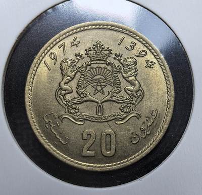 外国优质老铜币银币苏联纪念章，每周六晚九点倒数截拍，满百包邮可寄存，持续收拍 - 摩洛哥1974年20分，正面为哈桑二世国王头像，阿拉伯文铭文环绕，背面双狮国徽精致，包浆温润，是北非伊斯兰钱币收藏的特色之选。