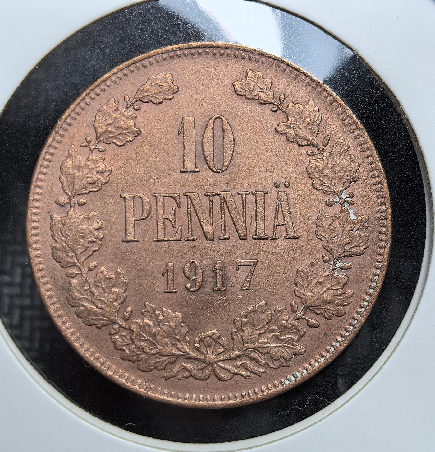外国优质老铜币银币苏联纪念章，每周六晚九点倒数截拍，满百包邮可寄存，持续收拍 俄占芬兰流亡政府1917 年10 盆尼铜币，双面图案清晰，双头鹰国徽与橡叶纹饰精美，年份完整，铜色包浆温润，是沙俄末期芬兰币的收藏佳品。