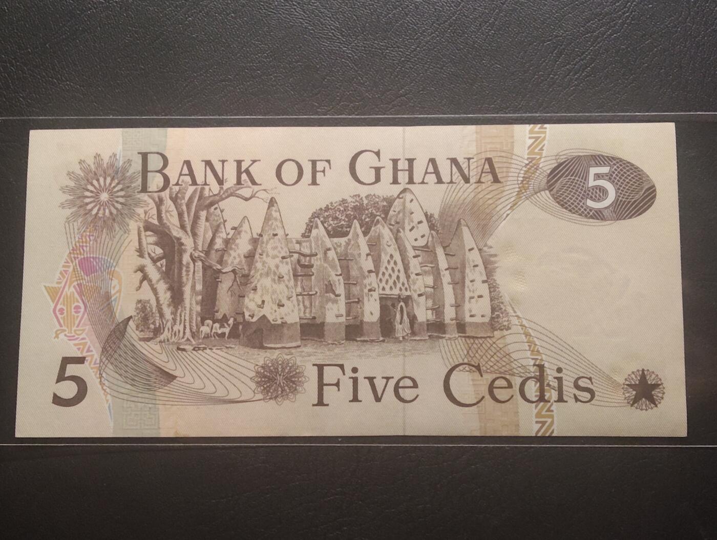 2026三月第四期，总221期 加纳1977年5塞地UNC微潮首冠N/1 呲牙乐的黑鬼和传统民居