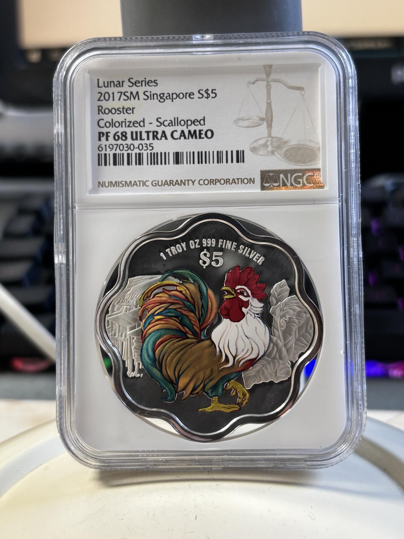 第194期拍卖 新加坡2017年十二生肖鸡年银币3枚套NGC-PF68一枚，PF69-2枚，1盎司/1盎司/1/4盎司，999银，发行2000套