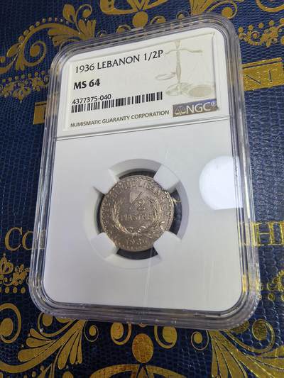 长老汇马年精选第十三场拍卖 - 1936黎巴嫩1/2皮阿斯特铜镍币，NGC MS64， NGC官网63分100美金