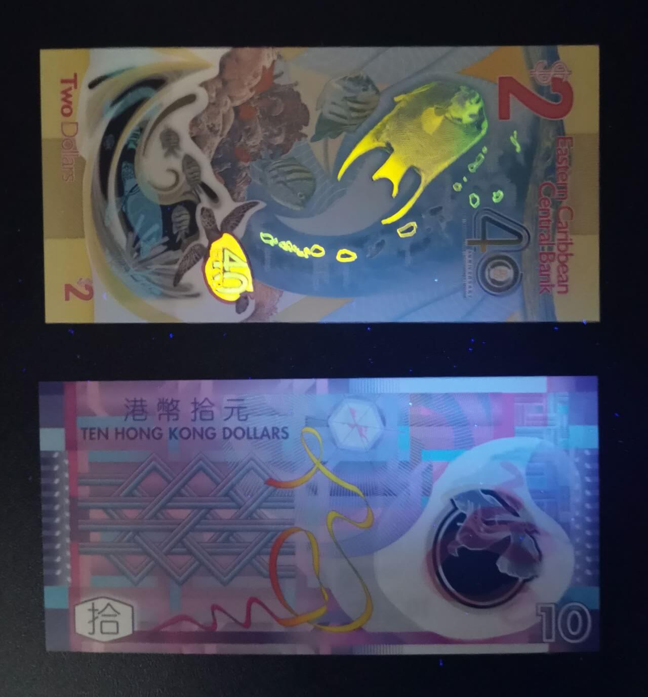 《艾美收藏》第238期-3.29周日外币畅拍场 (2张全新UNC)东加勒比2023年首发AA冠央行成立40周年纪念钞无347 IBNS年度最佳&香港2007年AA冠10元塑料钞无47 首冠首签 被《金钱的艺术》一书作者评为世界十大最美钞票之一