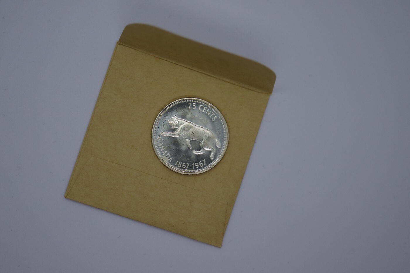 观钱 近现代机制币拍卖No.006（全场顺丰包邮，不区分偏远地区）  加拿大 1967 年联邦百年 25 分猞猁纪念银币 卷拆全新未使用