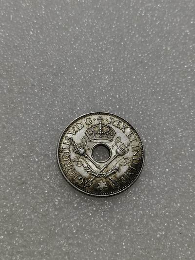 天下钱庄专场欢迎参拍 - 新几内亚中孔银币