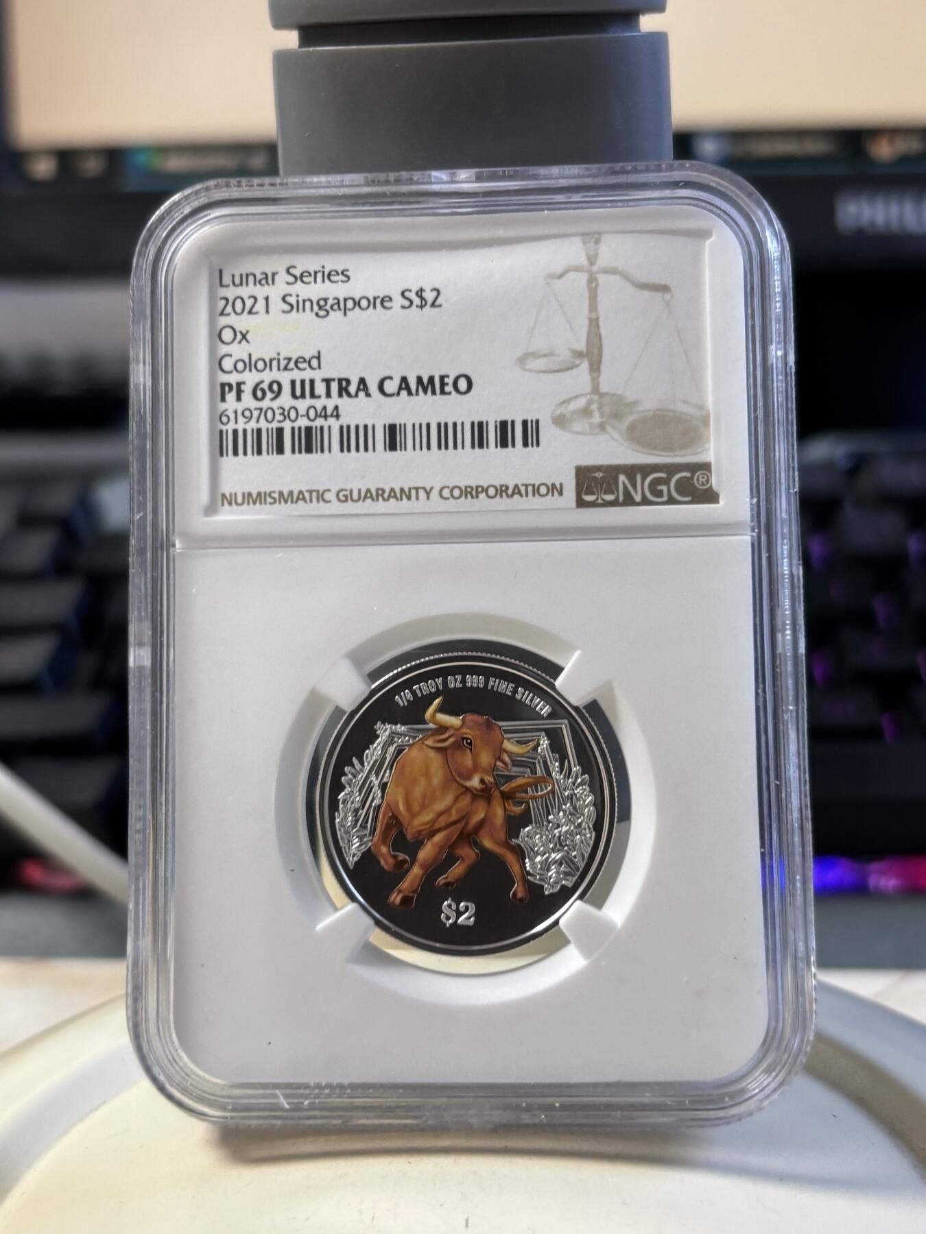 第194期拍卖 新加坡2021年十二生肖牛年银币3枚套NGC-PF69，1盎司/1盎司/1/4盎司，999银，发行2000套