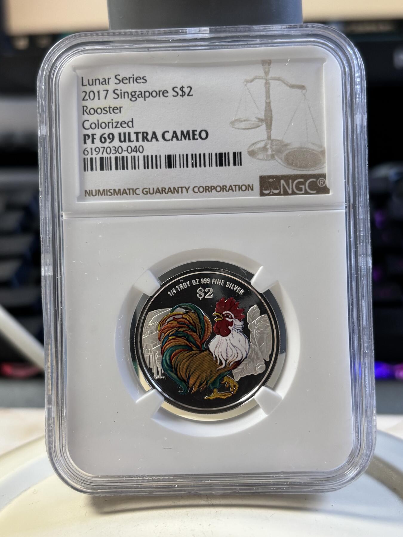 第194期拍卖 新加坡2017年十二生肖鸡年银币3枚套NGC-PF68一枚，PF69-2枚，1盎司/1盎司/1/4盎司，999银，发行2000套