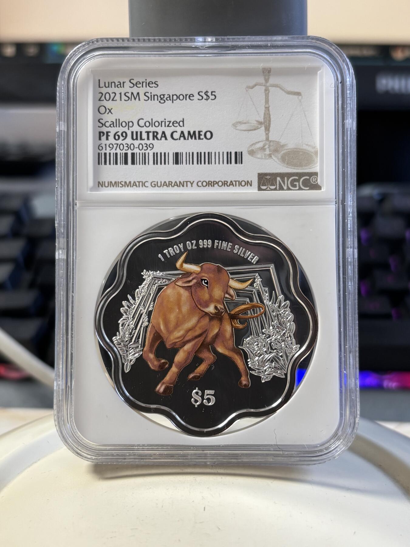 第194期拍卖 新加坡2021年十二生肖牛年银币3枚套NGC-PF69，1盎司/1盎司/1/4盎司，999银，发行2000套