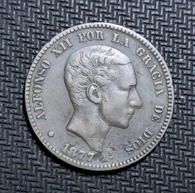 外国优质老铜币银币苏联纪念章，每周六晚九点倒数截拍，满百包邮可寄存，持续收拍 - 西班牙阿方索十二世1877年10分，正面为国王头像与神权铭文，背面是王冠盾徽与国名，见证波旁王朝复辟时期，包浆温润，是西班牙近代币制与王权历史的实物见证，收藏价值突出。