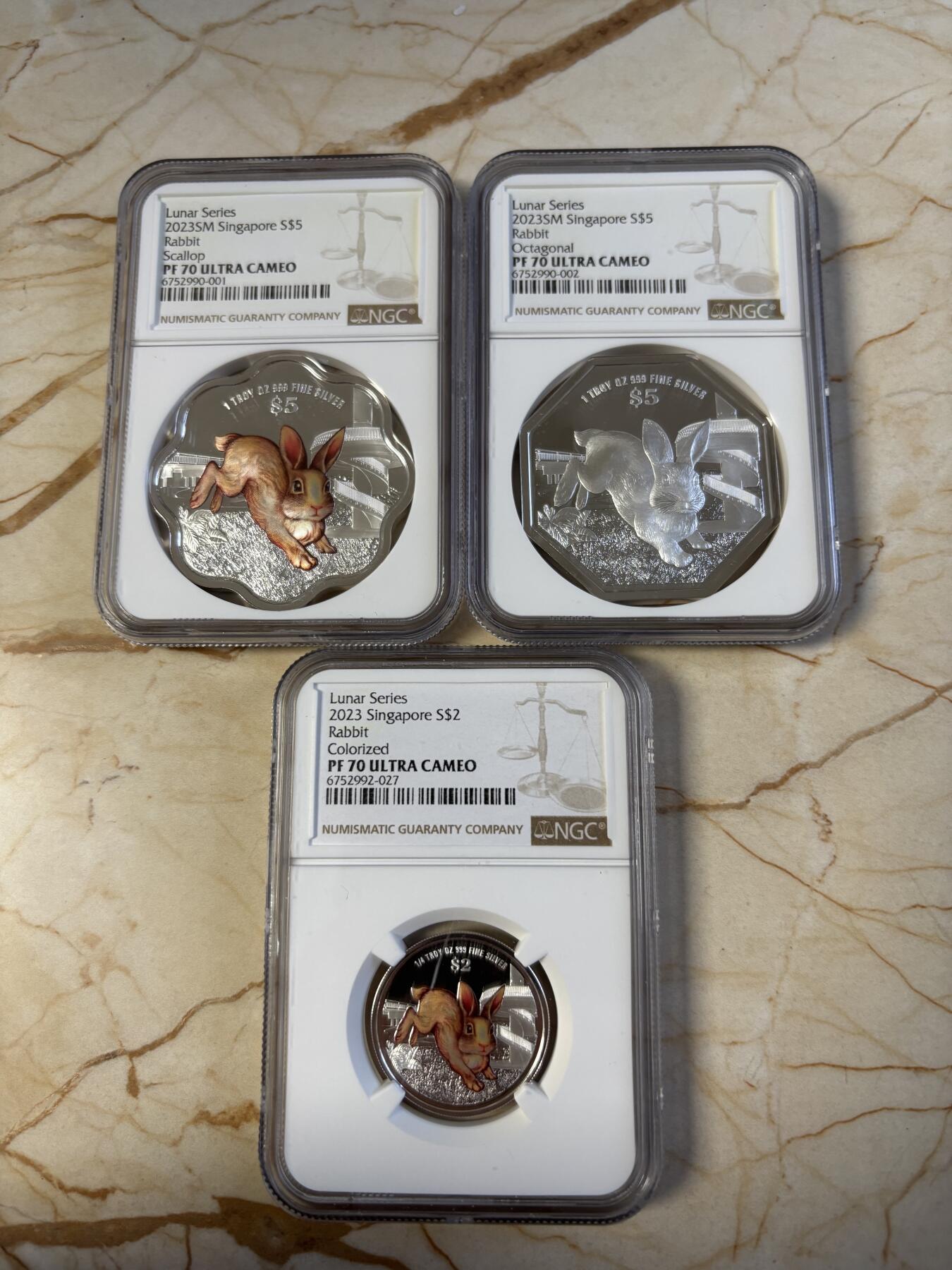 第194期拍卖 新加坡2023年十二生肖兔年银币3枚套NGC-PF70，1盎司/1盎司/1/4盎司，999银，发行2000套，无盒证