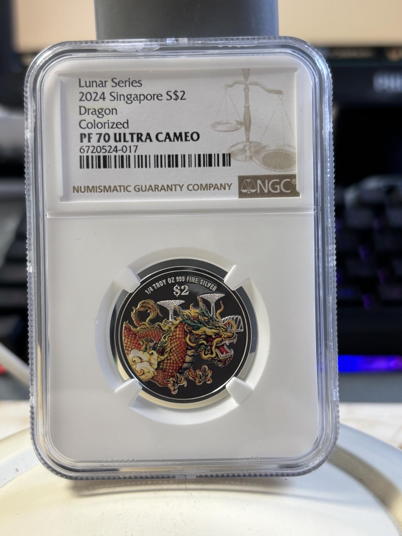 第194期拍卖 新加坡2024年十二生肖龙年银币3枚套NGC-PF70，1盎司/1盎司/1/4盎司，999银，发行2000套，无盒证