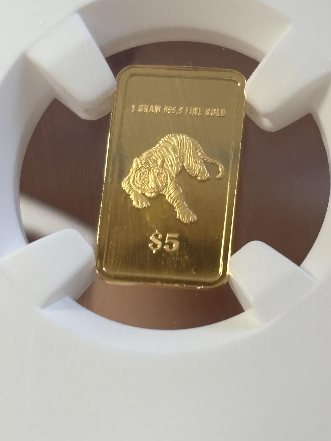 第194期拍卖 新加破2022年十二生肖虎年1克纪念金币NGC-PF69原盒证书，9999金，发行3000枚