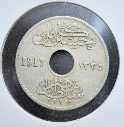 外国优质老铜币银币苏联纪念章，每周六晚九点倒数截拍，满百包邮可寄存，持续收拍 - 埃及1917年5米利姆铜镍币，独特中孔形制，阿拉伯文与双语面值并存，见证英埃共管时期，伊斯兰纹饰浓郁，是埃及近代币制与殖民历史的实物见证，收藏辨识度高。