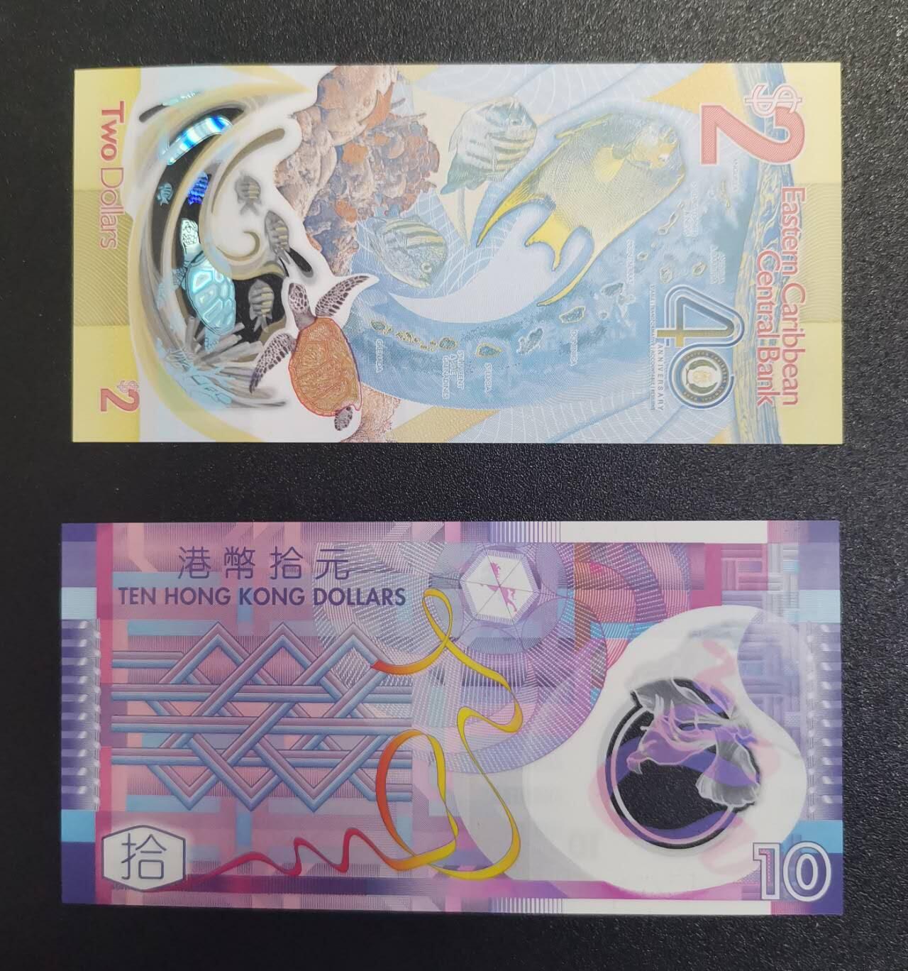 《艾美收藏》第238期-3.29周日外币畅拍场 (2张全新UNC)东加勒比2023年首发AA冠央行成立40周年纪念钞无347 IBNS年度最佳&香港2007年AA冠10元塑料钞无47 首冠首签 被《金钱的艺术》一书作者评为世界十大最美钞票之一