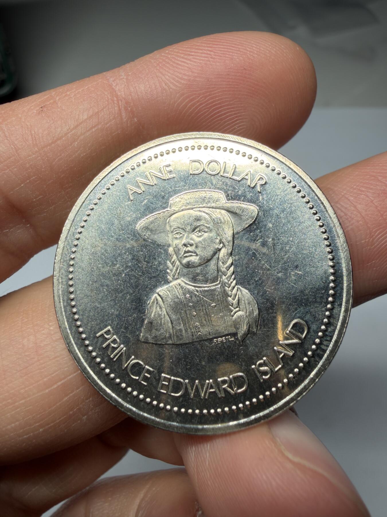 2026年集古藏今外币拍卖第三期-第9场—（总第319拍），可以寄存60天，满160元包邮。  爱德华王子岛安妮纪念代用币（Anne Dollar），直径33毫米