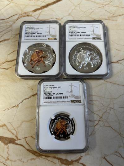 第194期拍卖 - 新加坡2021年十二生肖牛年银币3枚套NGC-PF69，1盎司/1盎司/1/4盎司，999银，发行2000套