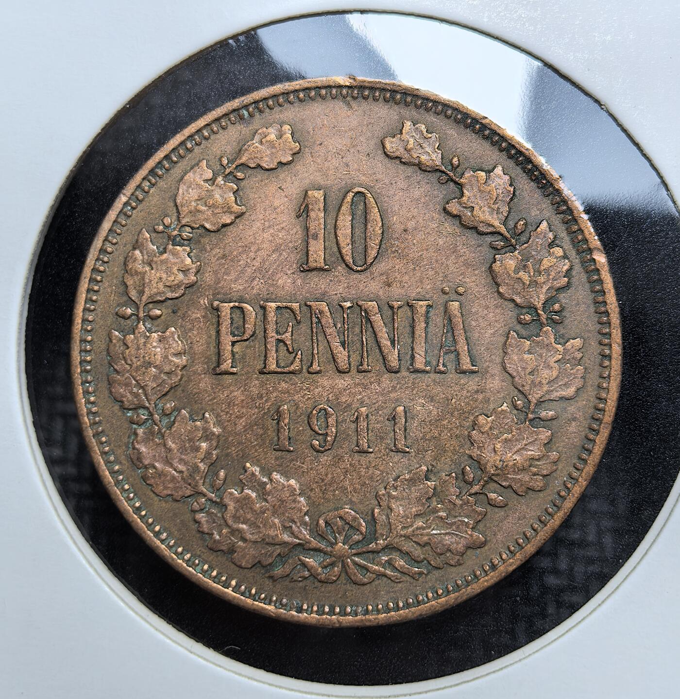 外国优质老铜币银币苏联纪念章，每周六晚九点倒数截拍，满百包邮可寄存，持续收拍 俄占芬兰 1911 年尼古拉二世 10 盆尼铜币，双冠花押与橡叶纹饰精美，年份清晰，铜色包浆温润，历史与收藏价值兼具，是沙俄殖民时期芬兰币的入门佳品