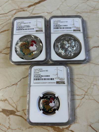 第194期拍卖 - 新加坡2017年十二生肖鸡年银币3枚套NGC-PF68一枚，PF69-2枚，1盎司/1盎司/1/4盎司，999银，发行2000套