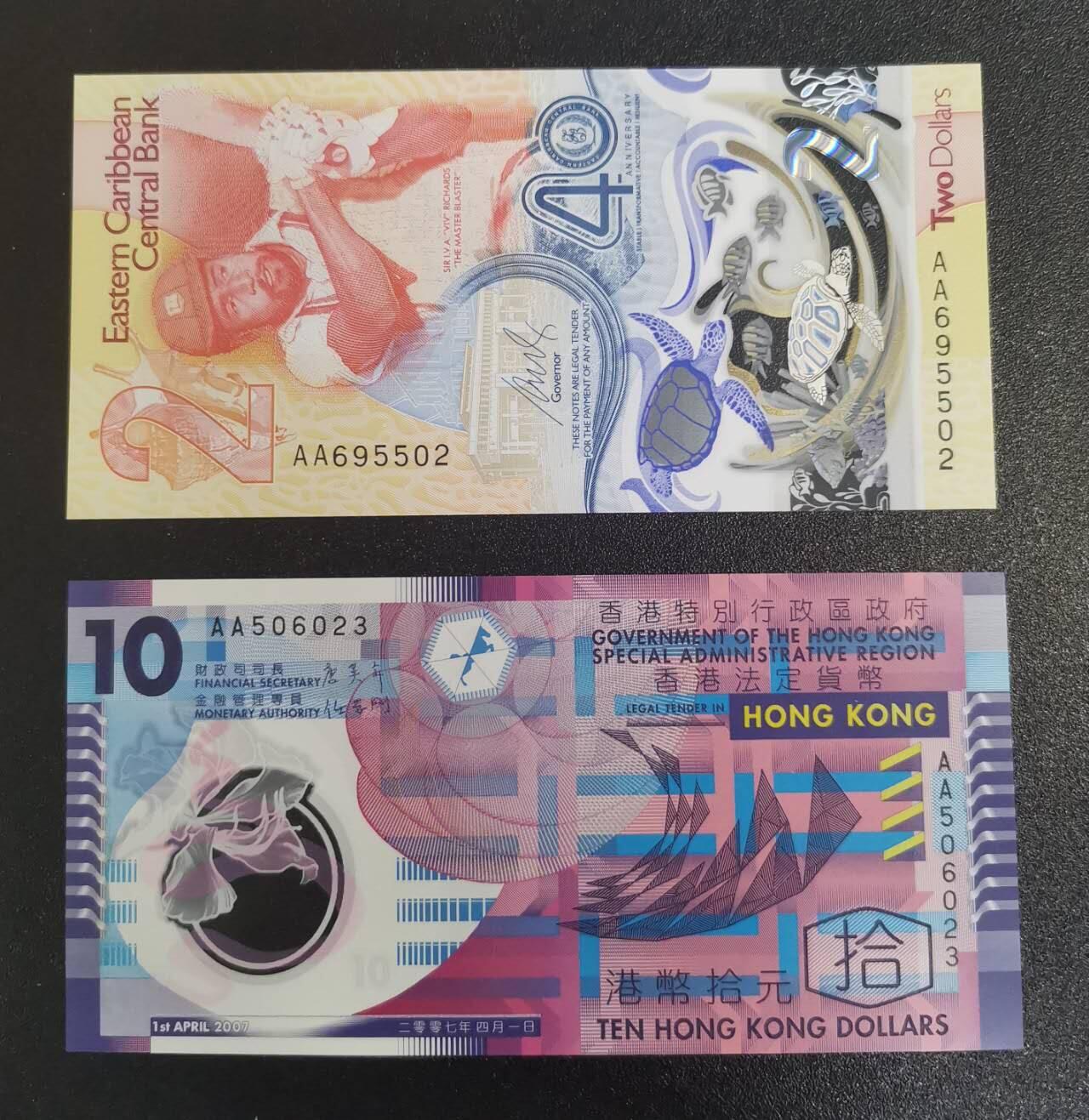 《艾美收藏》第238期-3.29周日外币畅拍场 (2张全新UNC)东加勒比2023年首发AA冠央行成立40周年纪念钞无347 IBNS年度最佳&香港2007年AA冠10元塑料钞无47 首冠首签 被《金钱的艺术》一书作者评为世界十大最美钞票之一