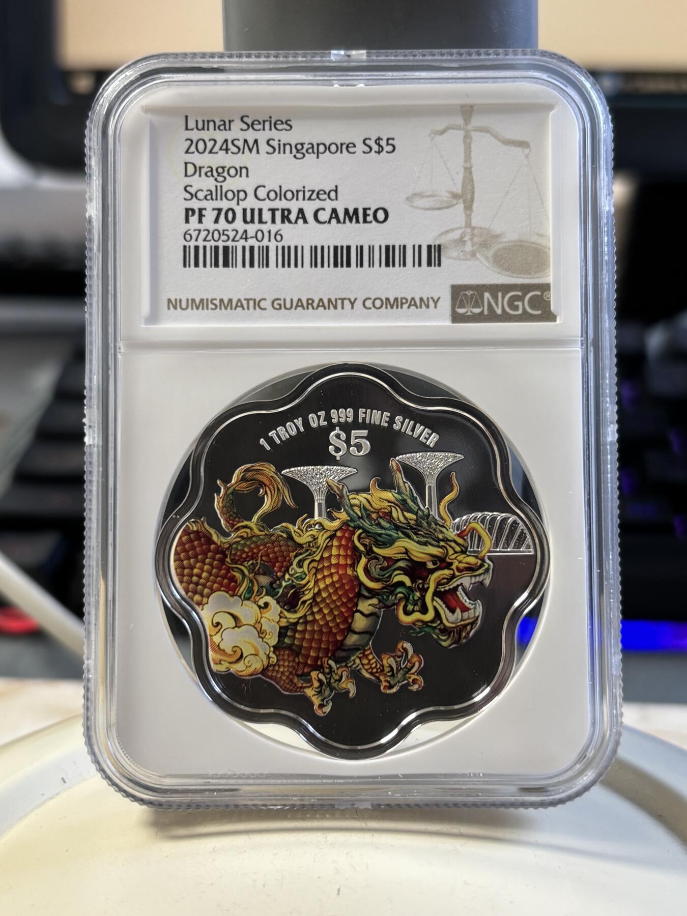 第194期拍卖 新加坡2024年十二生肖龙年银币3枚套NGC-PF70，1盎司/1盎司/1/4盎司，999银，发行2000套，无盒证