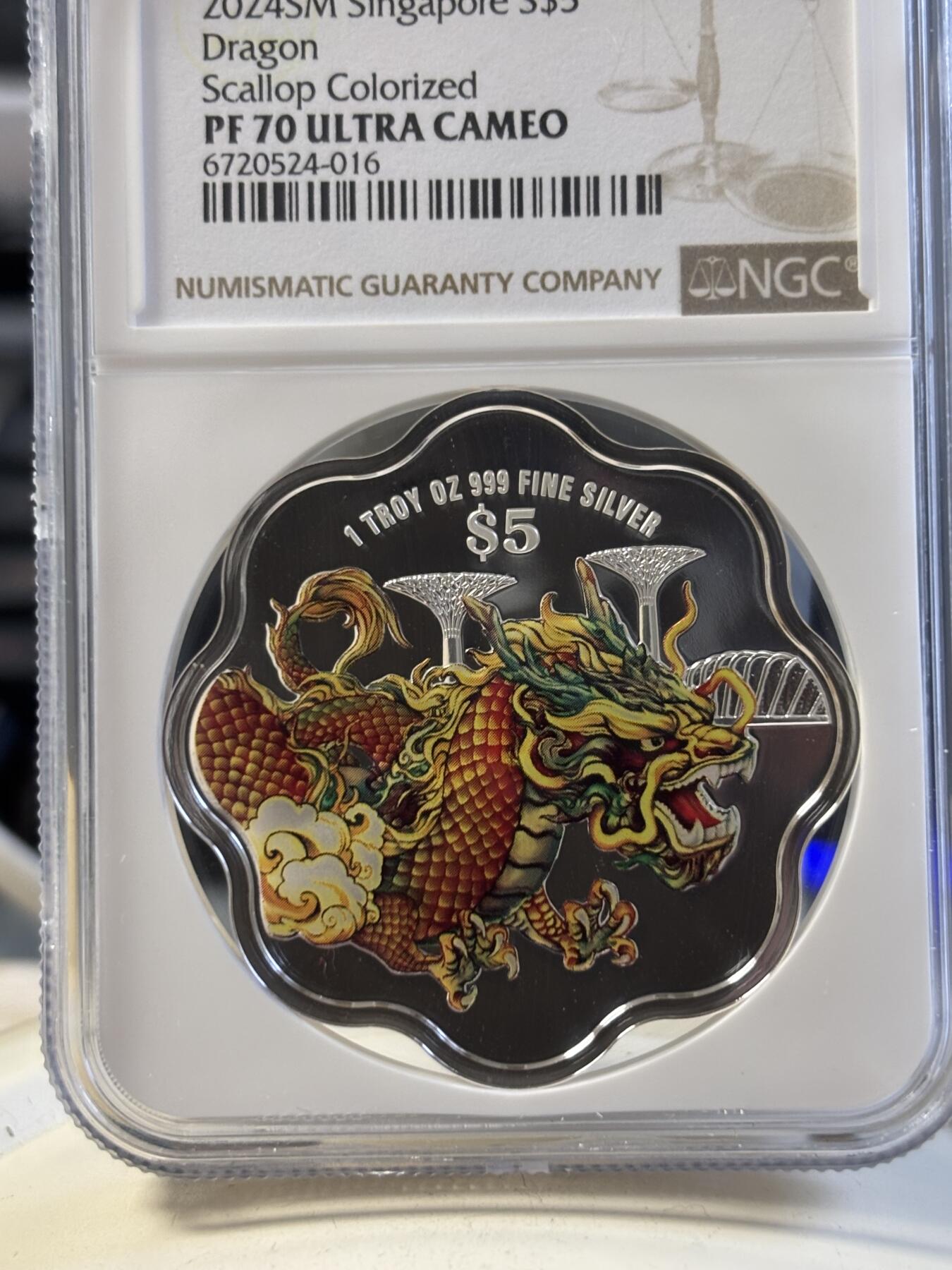 第194期拍卖 新加坡2024年十二生肖龙年银币3枚套NGC-PF70，1盎司/1盎司/1/4盎司，999银，发行2000套，无盒证