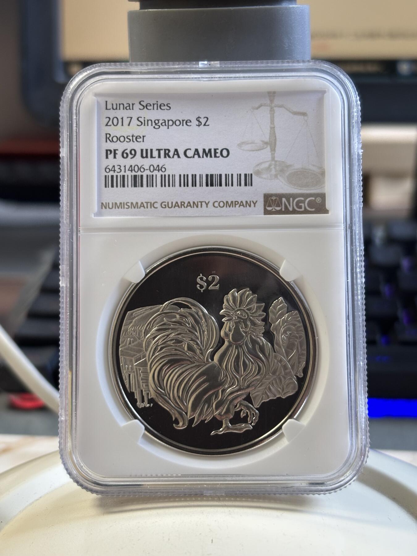 第194期拍卖 新加坡2017年十二生肖鸡年铜镍纪念币NGC-PF69带盒证书
