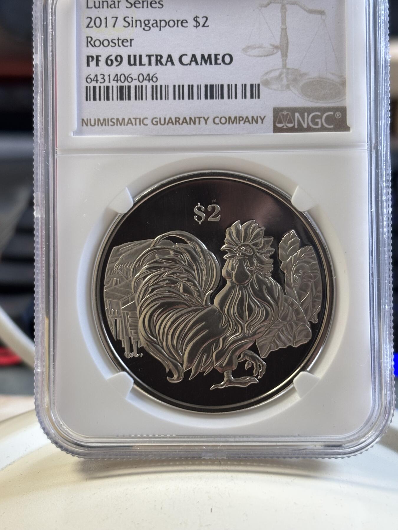 第194期拍卖 新加坡2017年十二生肖鸡年铜镍纪念币NGC-PF69带盒证书