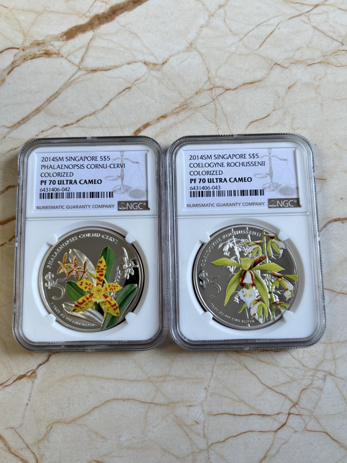 第194期拍卖 新加坡2014年花卉系列彩色1盎司纪念银币2枚套NGC-PF70,999银，1盎司*2