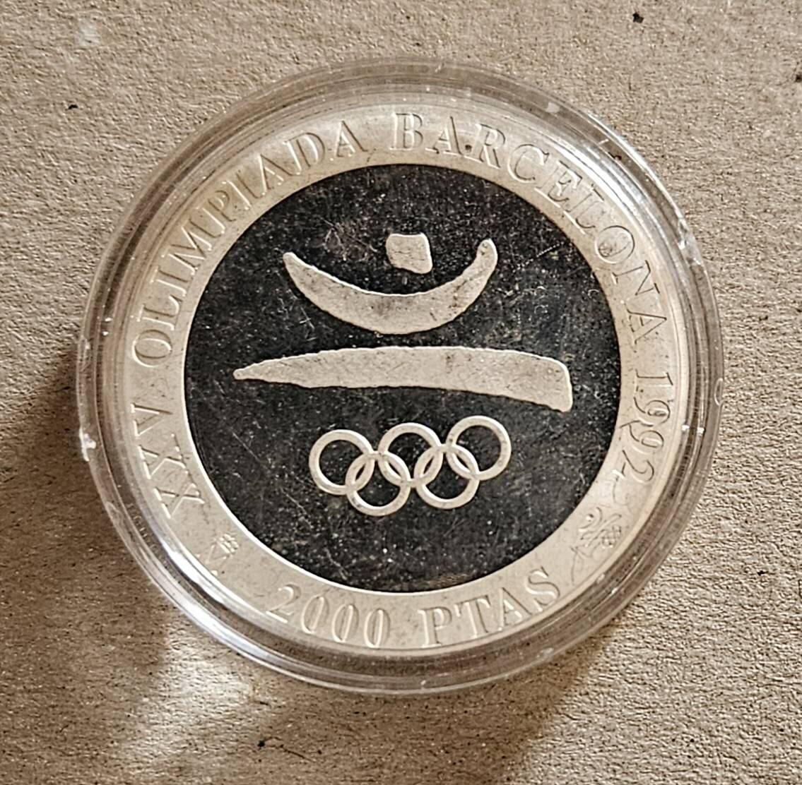 【币将精彩】世界钱币拍卖（2026-4-15） 西班牙1992年巴塞罗那奥运会会徽银币单面样币品如图有镜面瑕疵和氧化925银27克少见品