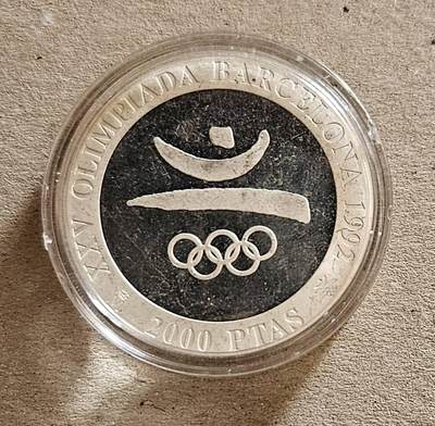 【币将精彩】世界钱币拍卖（2026-4-15） - 西班牙1992年巴塞罗那奥运会会徽银币单面样币品如图有镜面瑕疵和氧化925银27克少见品