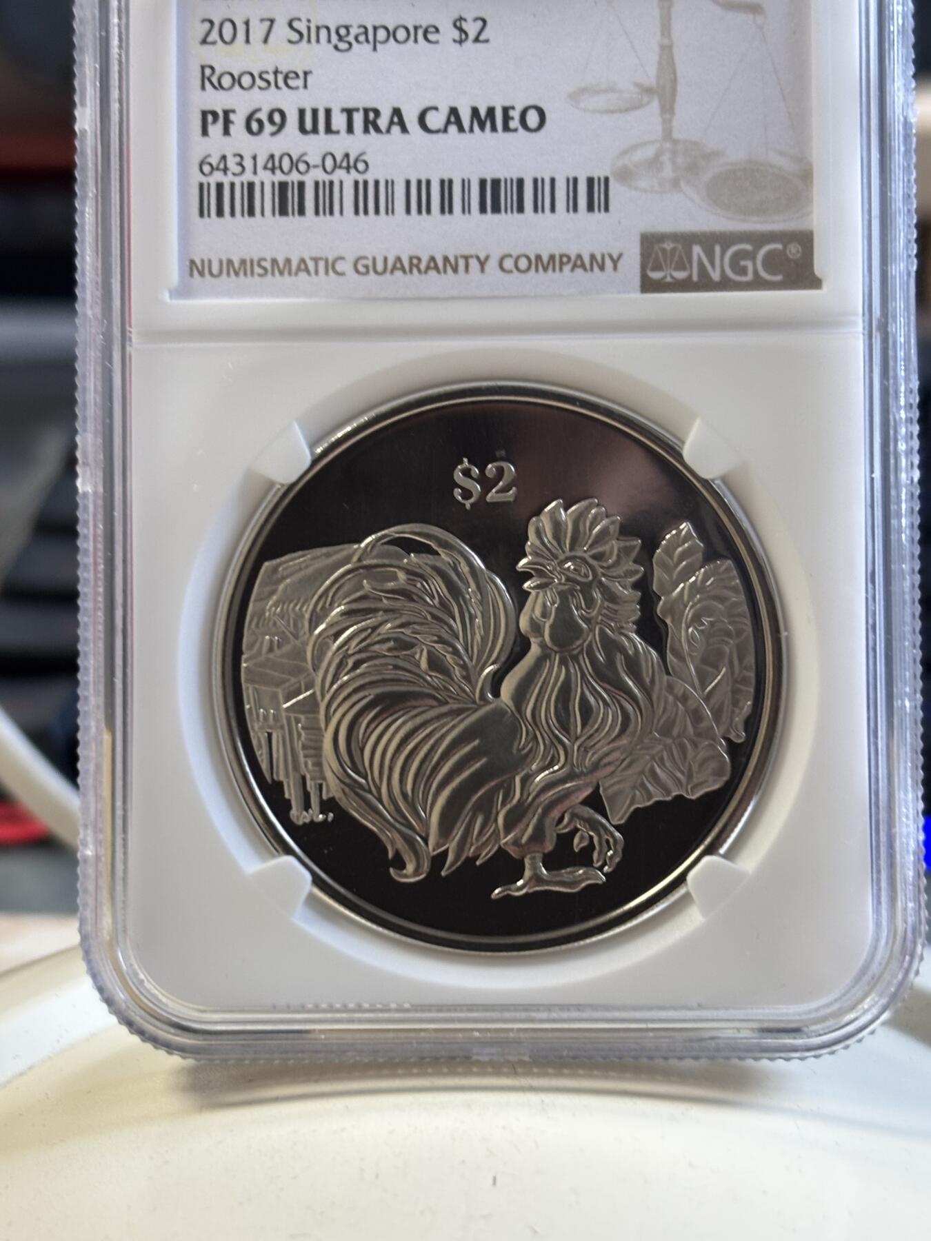 第194期拍卖 新加坡2017年十二生肖鸡年铜镍纪念币NGC-PF69带盒证书