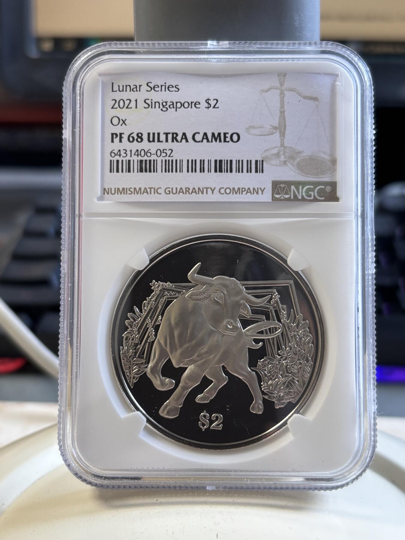 第194期拍卖 新加坡2021年十二生肖牛年铜镍纪念币NGC-PF68带盒证书