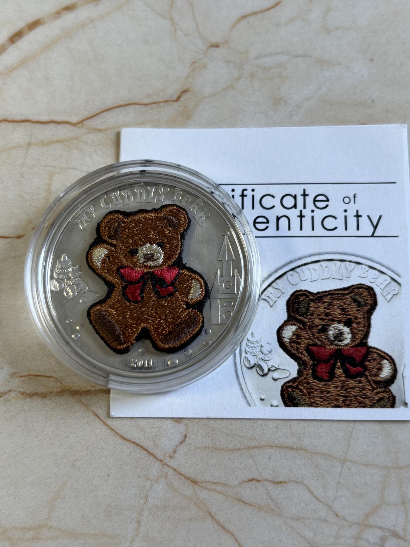 第194期拍卖 帕劳2011年泰迪熊镶嵌实体瑞士刺绣针织纪念银币带证书，25克，925银，有氧化