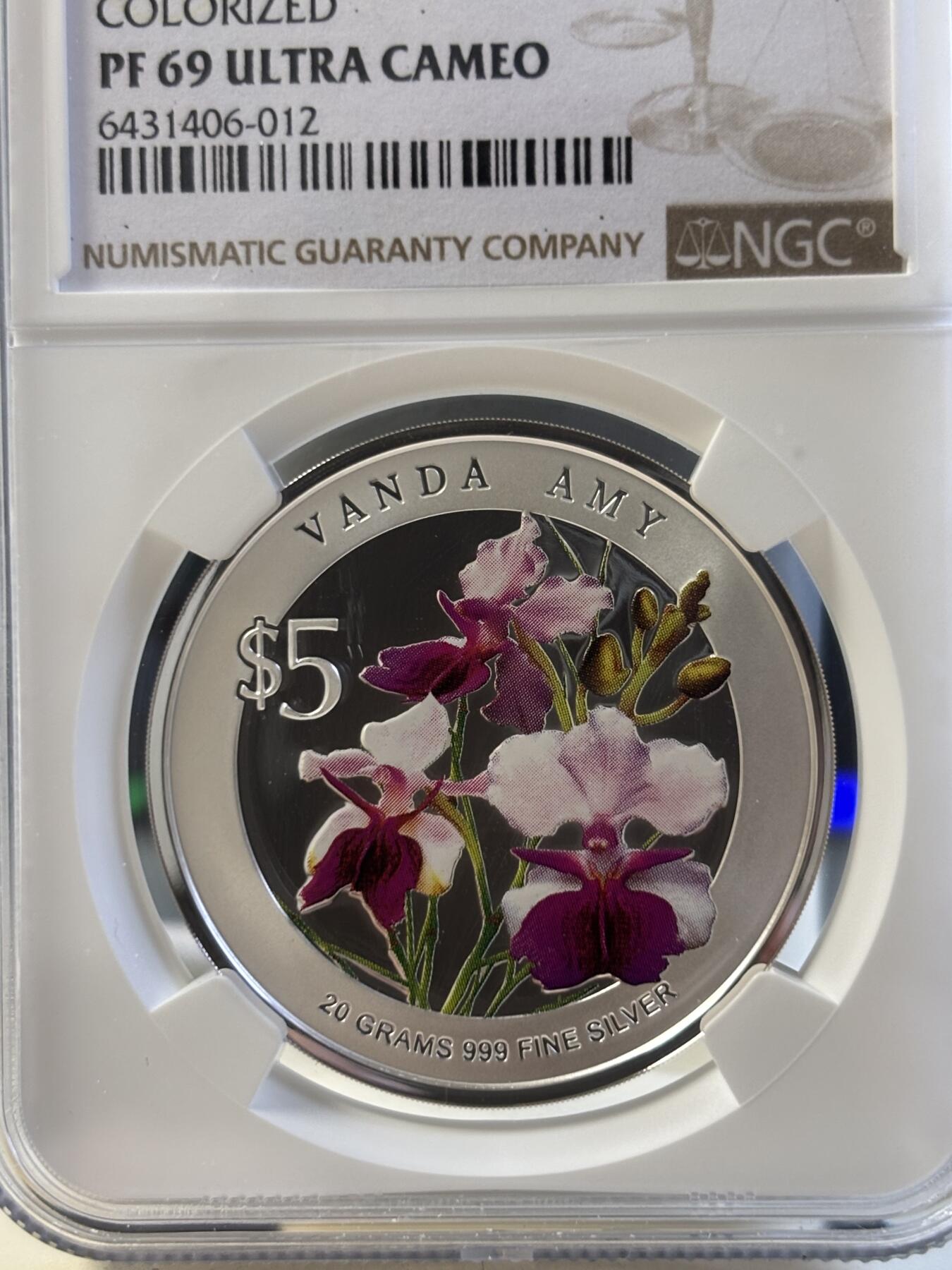 第194期拍卖 新加坡2009年花卉系列彩色20克纪念银币2枚套NGC-PF70-PF69,999银，20克*2