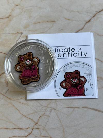第194期拍卖 - 帕劳2012年（瑞士刺绣）幸福的小熊精制银币带证书，925银，20克 ，发行2012枚，有氧化