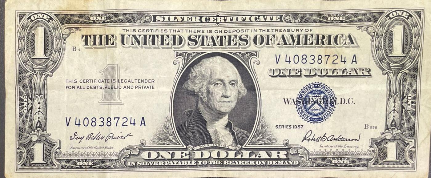 回流0328 美国1957年版1美元银券（Silver Certificate），是美国银券体系后期的经典品种，仍保留“见票即付白银”的兑付承诺