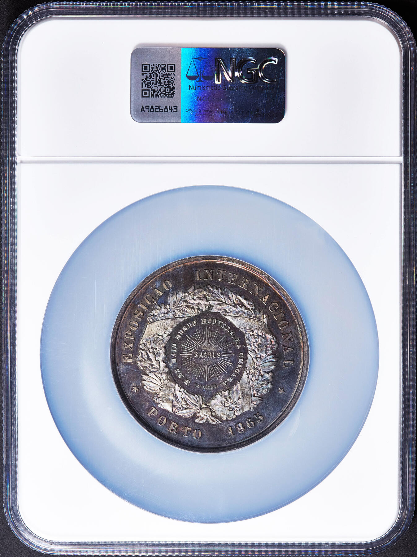 【俄甄集藏】2026年(050)04-01星期三 晚 19:30 全场包邮 葡萄牙1865年纪念波尔图世博会大银章，NGC MS61，高浮雕，类精制底板，酱彩包浆，奥地利著名雕刻家夏尔·维纳作品，展示了葡萄牙工业化与殖民化的时代背景，直径：58mm，重约76克，稀少品种