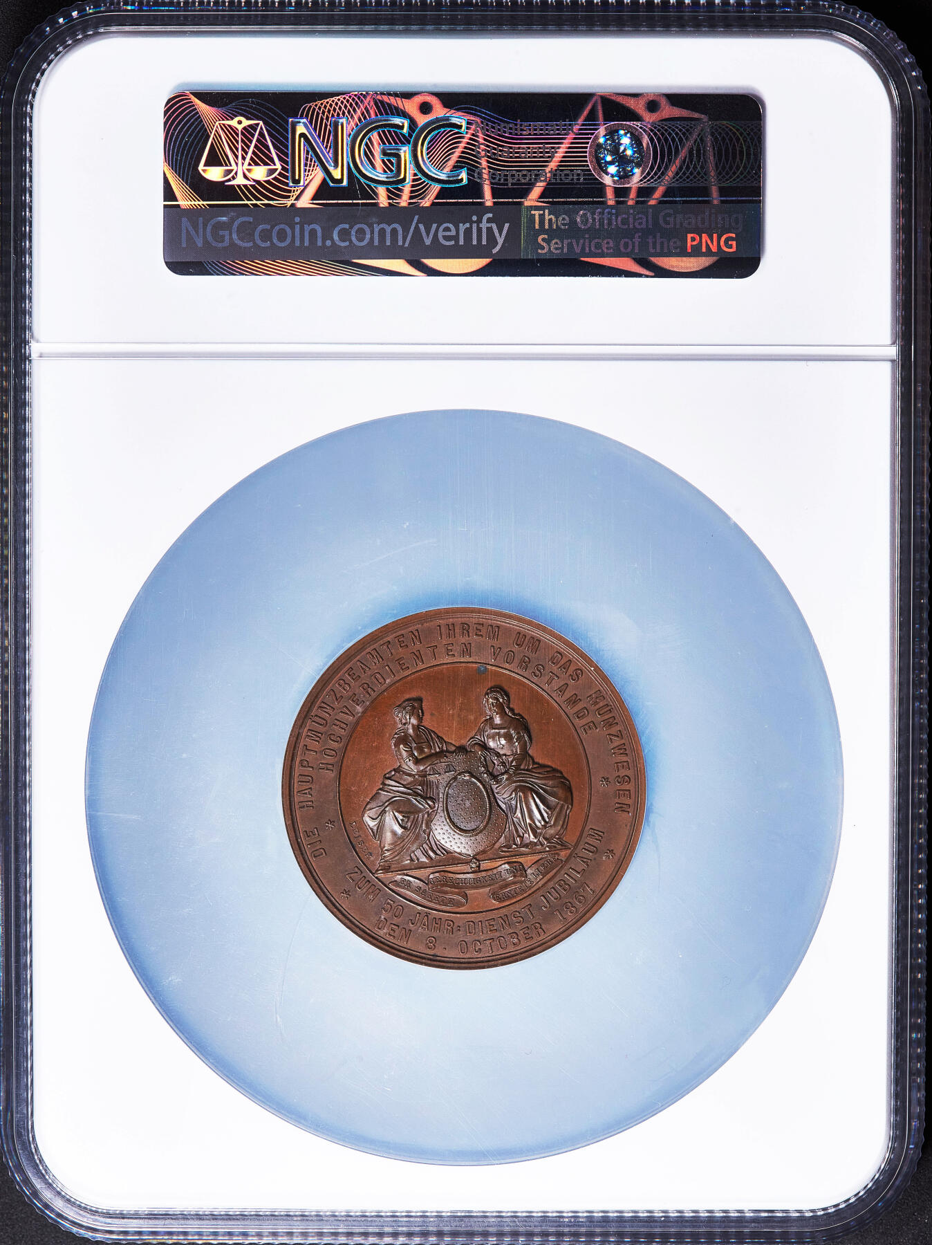 【俄甄集藏】2026年(050)04-01星期三 晚 19:30 全场包邮 奥匈帝国1867年纪念维也纳皇家铸币局长约翰·哈森鲍尔·里特·冯·席勒忠诚服务50年大铜章，NGC MS64，高浮雕，著名雕刻家约瑟夫·陶滕海恩与卡尔·沙夫联合创作，是奥匈帝国时期铸币业的发展的重要见证，直径：46mm