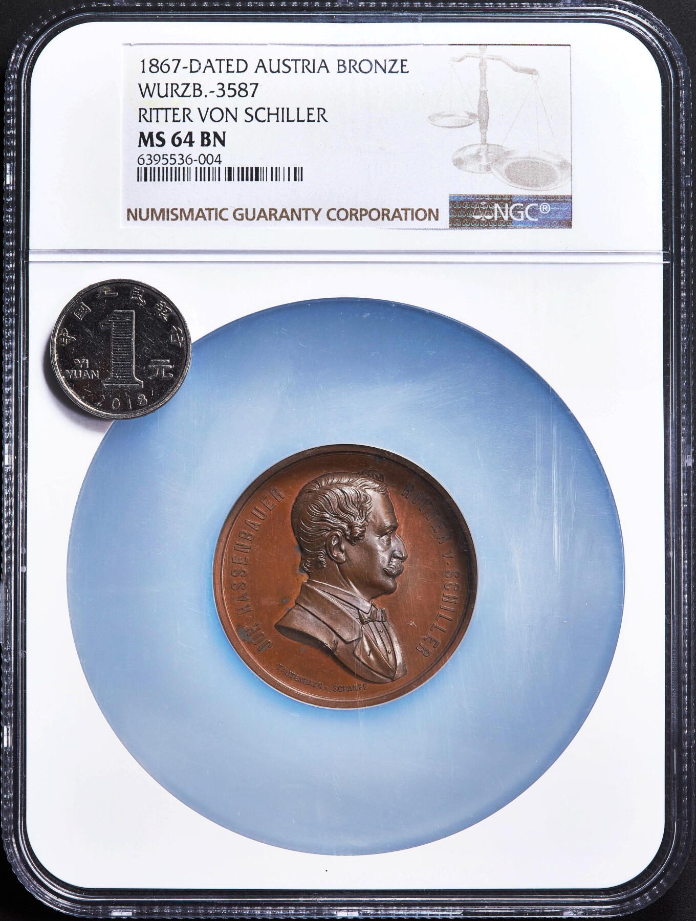 【俄甄集藏】2026年(050)04-01星期三 晚 19:30 全场包邮 奥匈帝国1867年纪念维也纳皇家铸币局长约翰·哈森鲍尔·里特·冯·席勒忠诚服务50年大铜章，NGC MS64，高浮雕，著名雕刻家约瑟夫·陶滕海恩与卡尔·沙夫联合创作，是奥匈帝国时期铸币业的发展的重要见证，直径：46mm