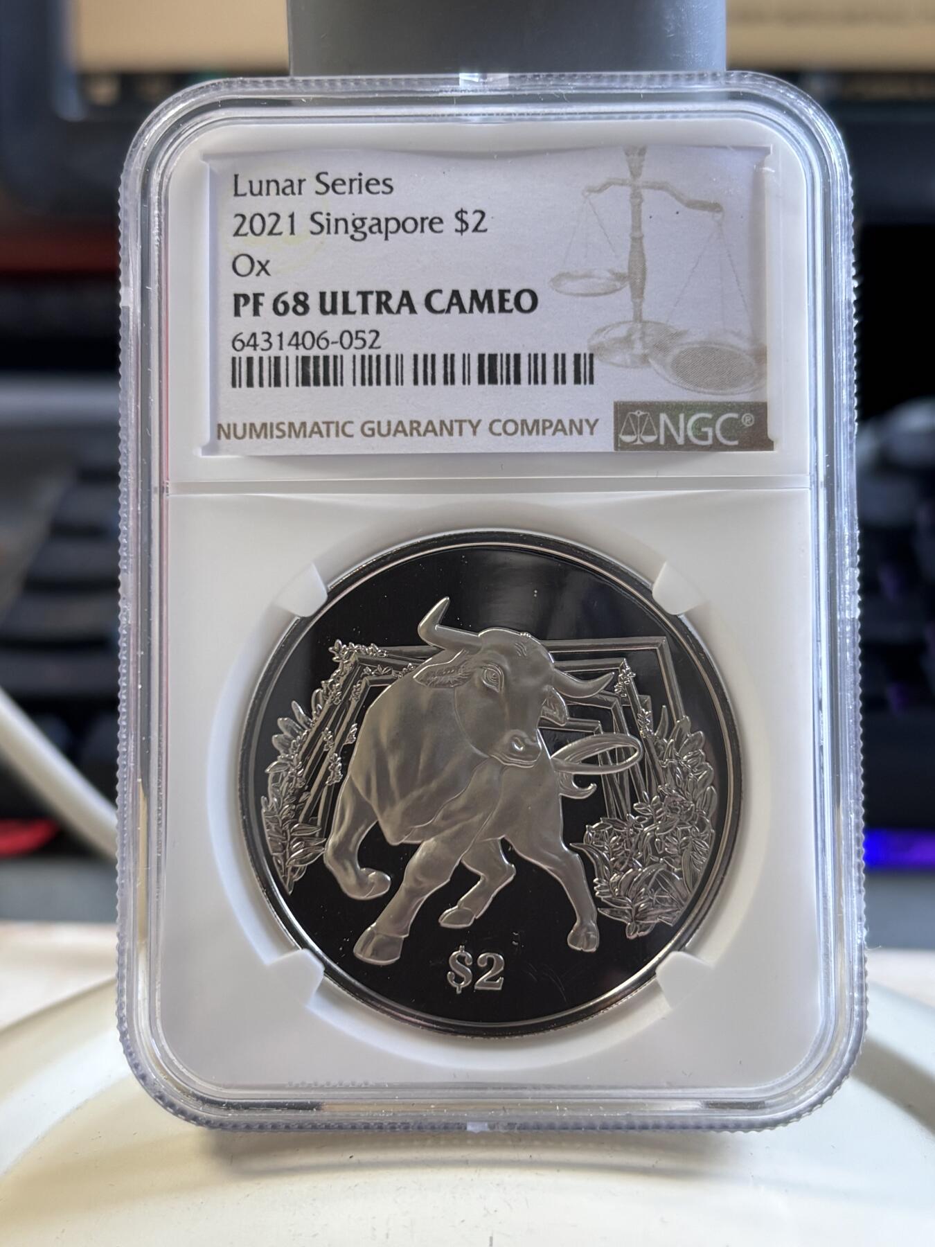 第194期拍卖 新加坡2021年十二生肖牛年铜镍纪念币NGC-PF68带盒证书
