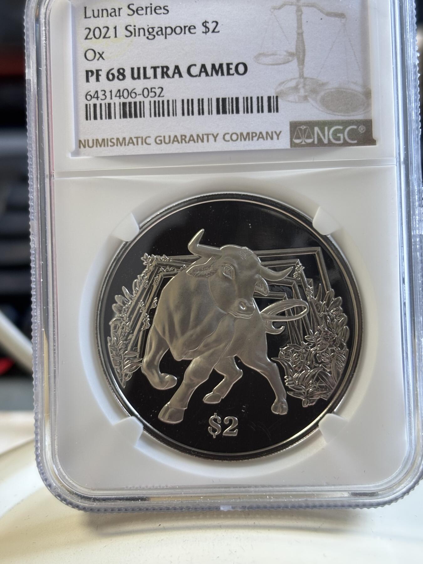 第194期拍卖 新加坡2021年十二生肖牛年铜镍纪念币NGC-PF68带盒证书