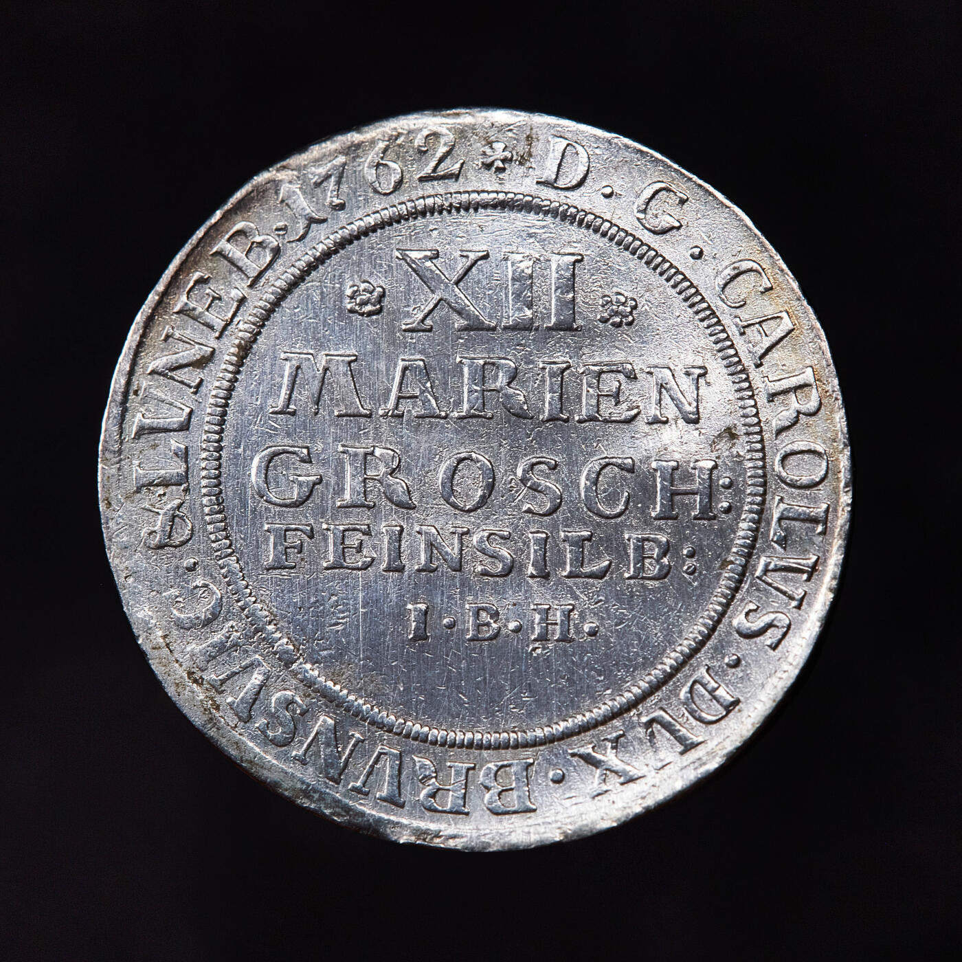 【俄甄集藏】2026年(050)04-01星期三 晚 19:30 全场包邮 神圣罗马帝国-德国不伦瑞克-沃尔芬比特尔1762年卡尔一世野人12格罗申银币，直径：30mm，重量：6.5克，流通品相，少见品种