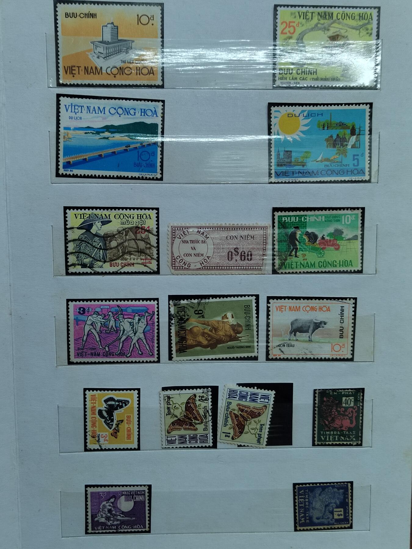 PCAI钱币  28-790 钱币证章邮票小专场 早期的南北越邮票一组  每张邮票后附了张小黑纸