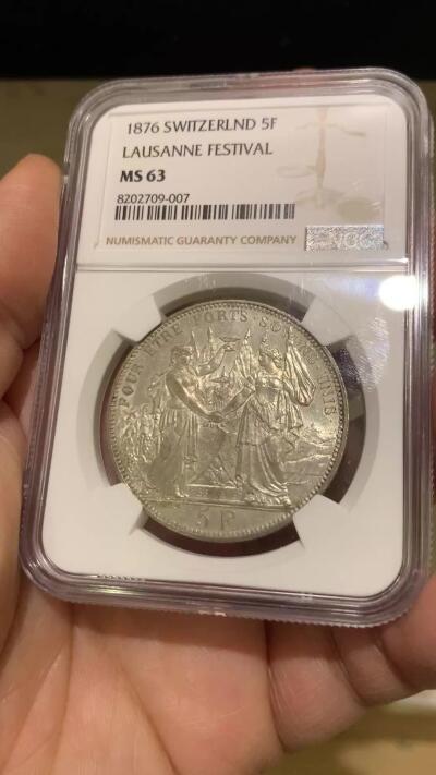 《竞宝斋》第475场 周日，周一 2场连拍 （全场包邮）欢迎送拍 NGC MS63 瑞士1876年洛桑射击节5法郎银币。双面光度非常好，细节极美。
