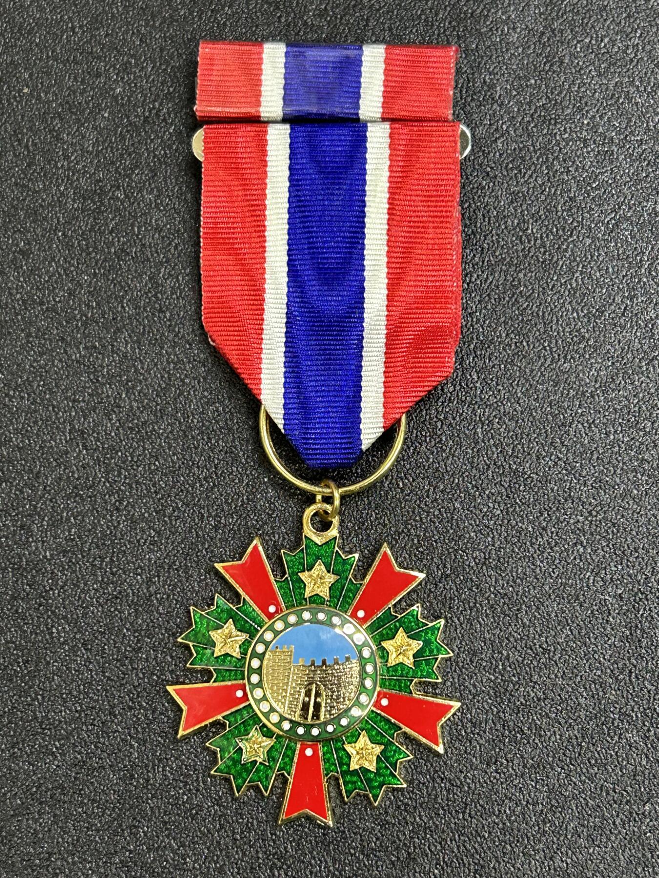 西秦中古拍卖第八十二期  民国甲种一等干城奖章 带勋略 退台后