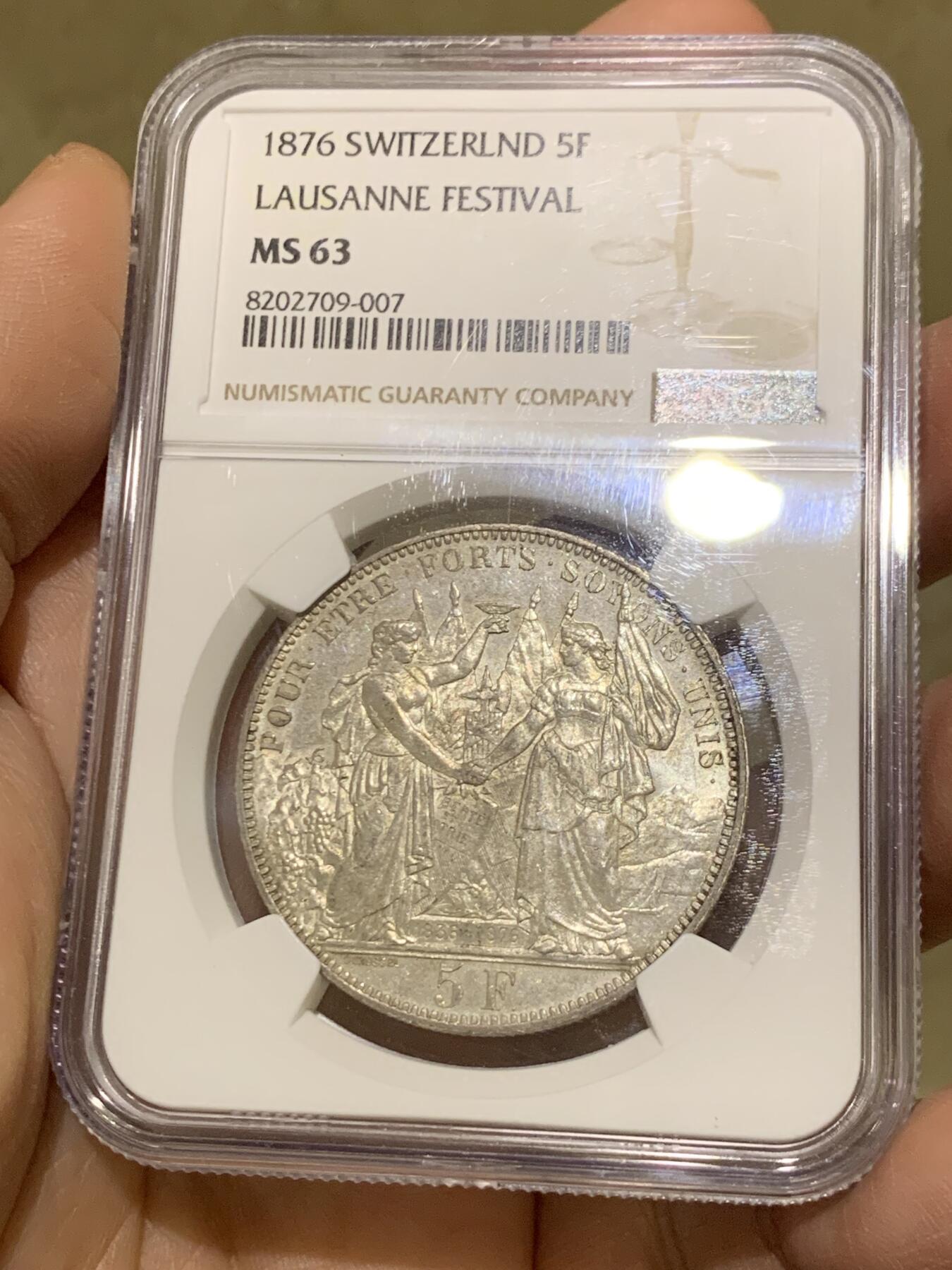 《竞宝斋》第475场 周日，周一 2场连拍 （全场包邮）欢迎送拍 NGC MS63 瑞士1876年洛桑射击节5法郎银币。双面光度非常好，细节极美。